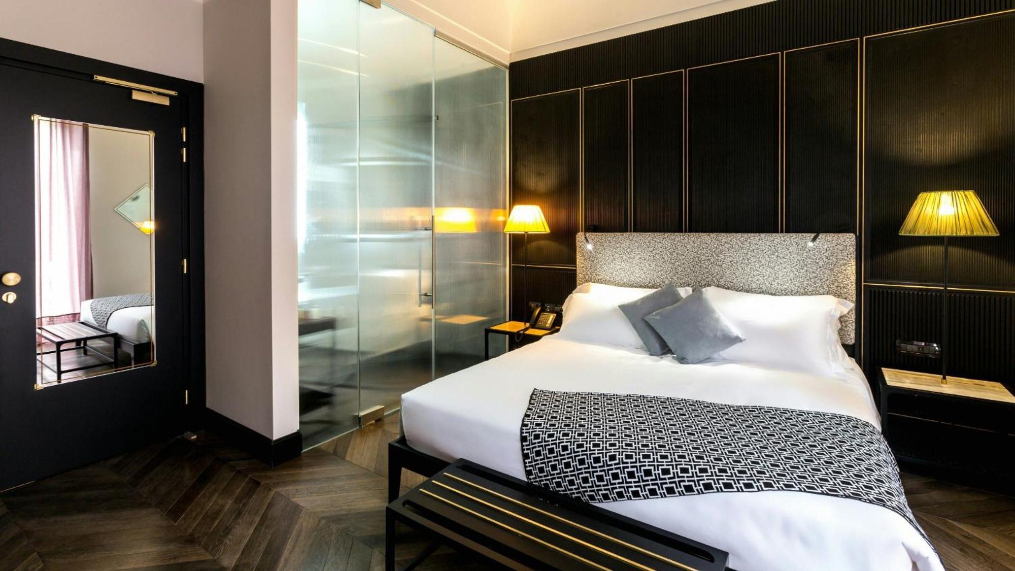 Hotel The Haven Roma Exterior foto A bedroom at the hotel