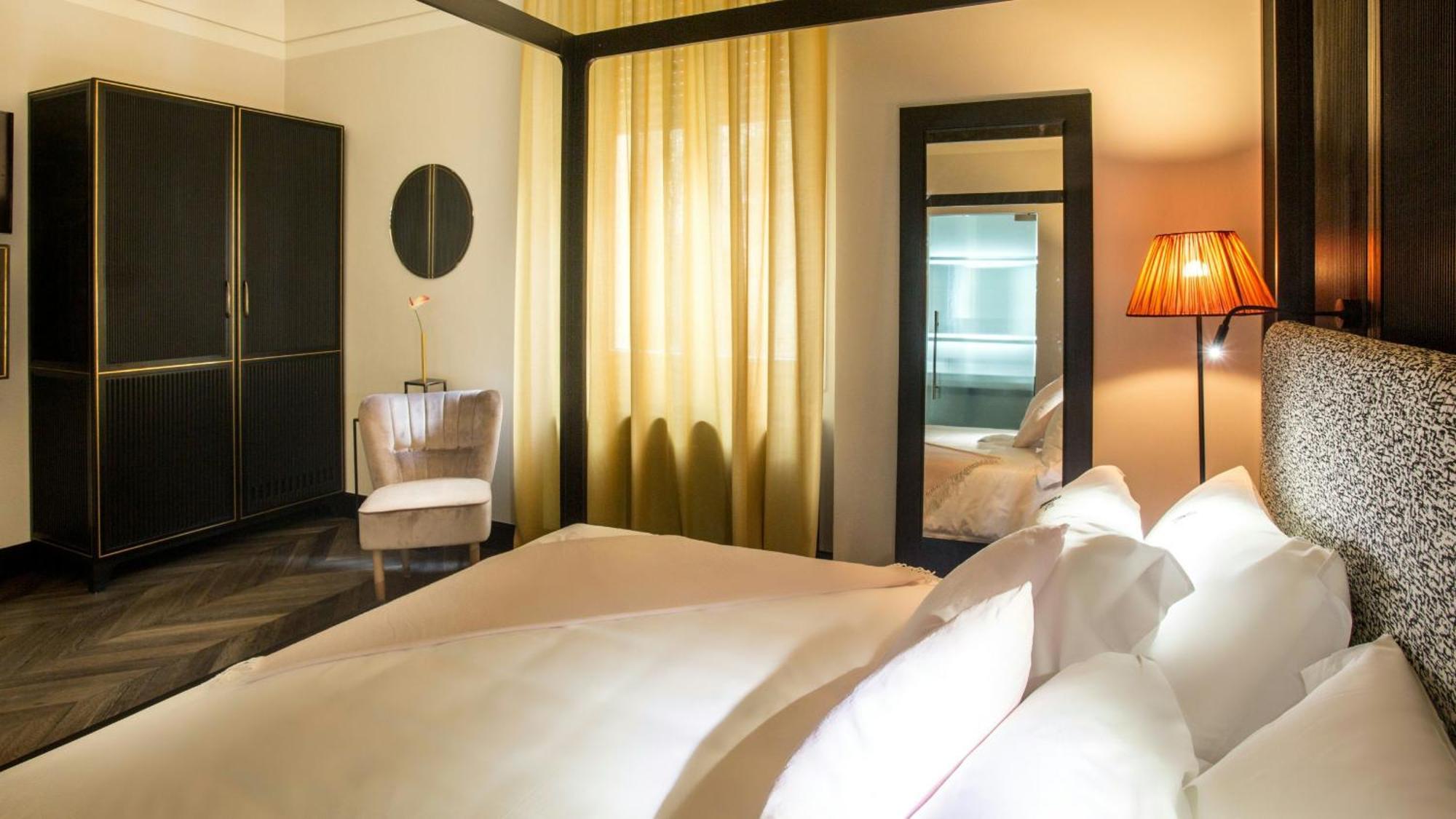 Hotel The Haven Roma Exterior foto A bedroom at the hotel
